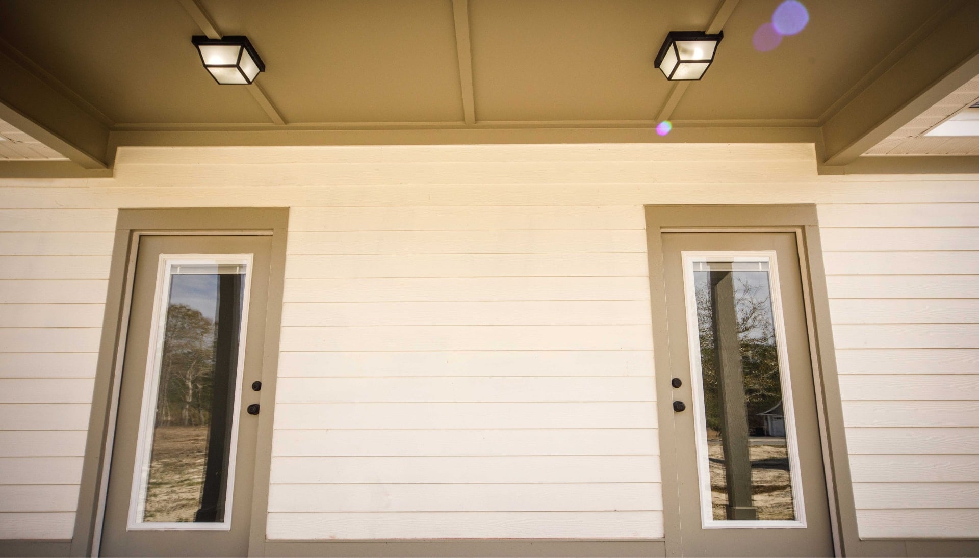 We offer siding services in Reno, Nevada. Hardie plank siding installation in a front entry way.